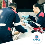 basic airway patient being handled by two emergency medical technicians