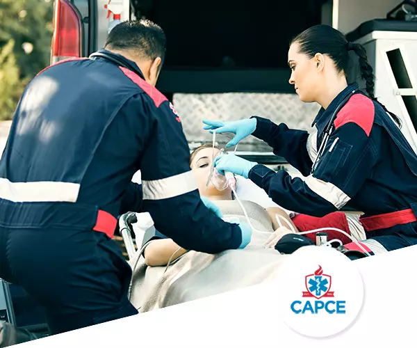 basic airway patient being handled by two emergency medical technicians